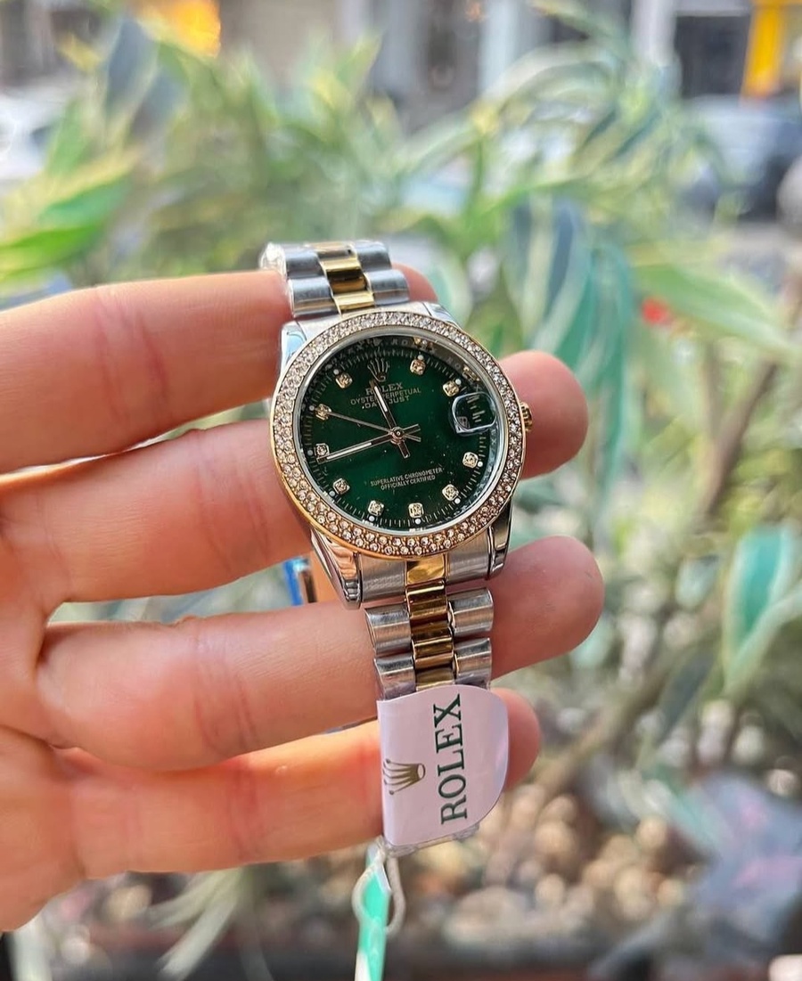 ساعة Rolex ديت جاست مينا اخضر 31mm