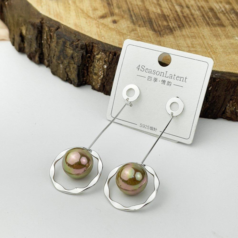 Planet Orbit Earrings – Silver Ring with Brown & Green Globe