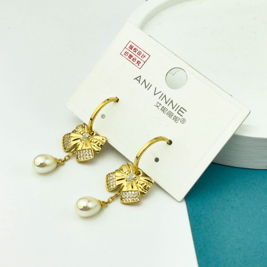 Golden Bow Pearl Drop Earrings – Silver 925 with Zircon