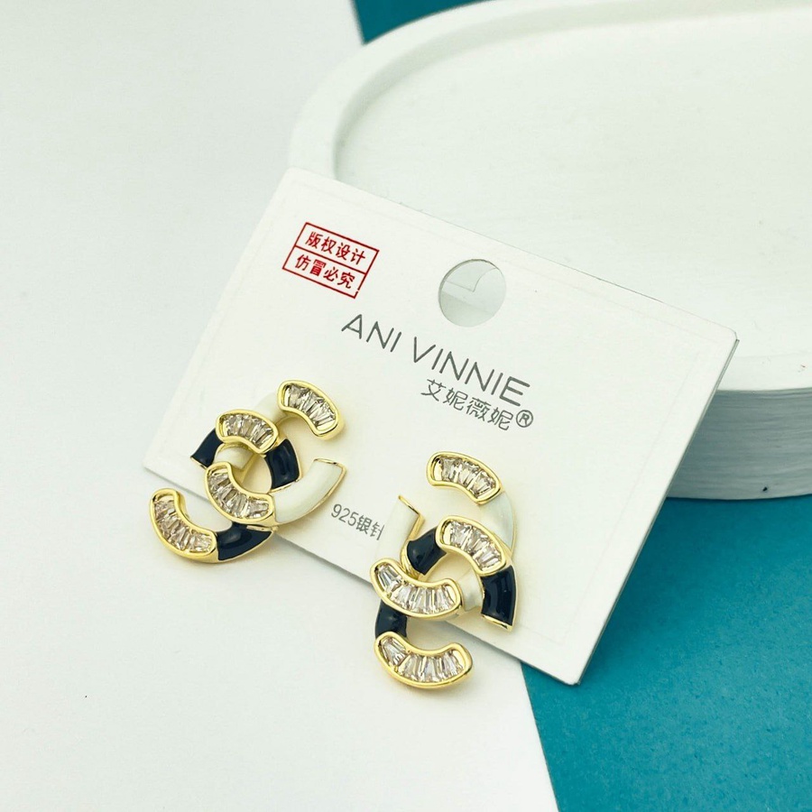 Golden Interlocking Double C Earrings – Zircon Accent