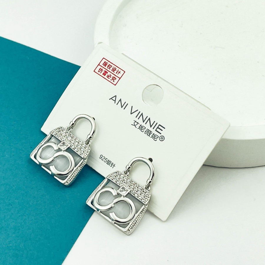 Silver Lock Infinity Earrings – Zircon Accent