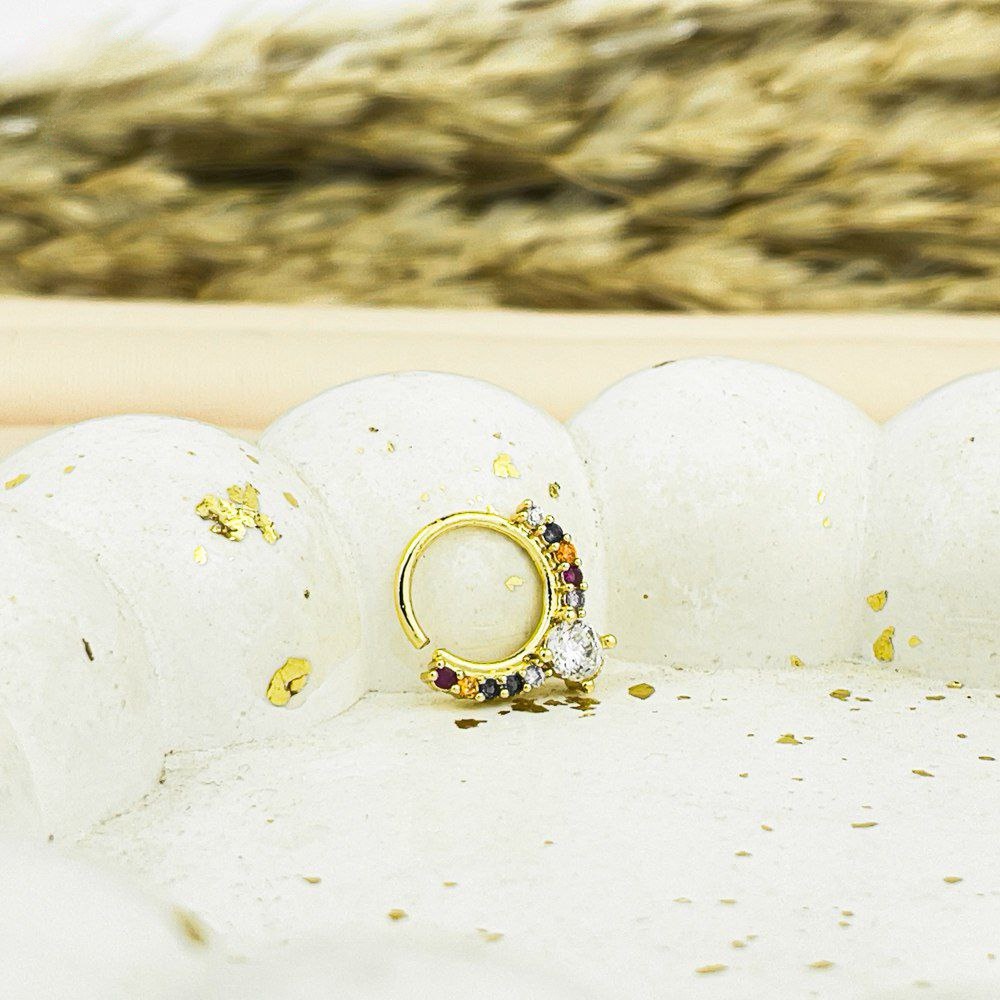 Golden Aura Nose Piercing – Multicolor Zircons with Clear Center