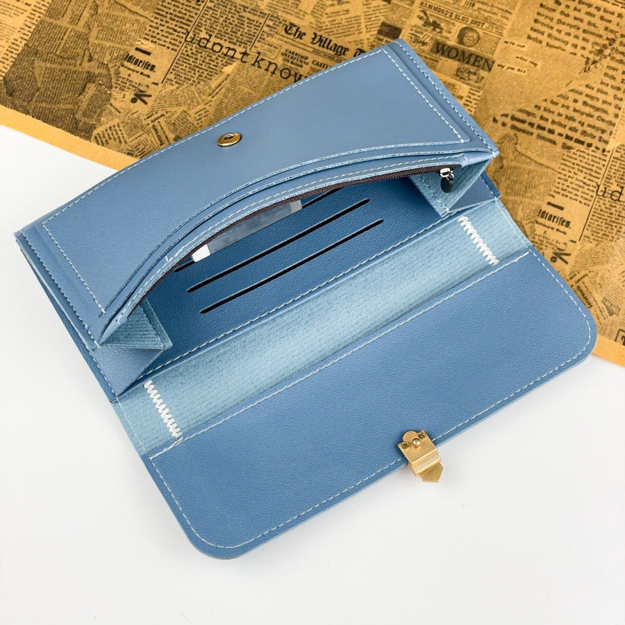 THE CONTRAST STITCH CLUTCH