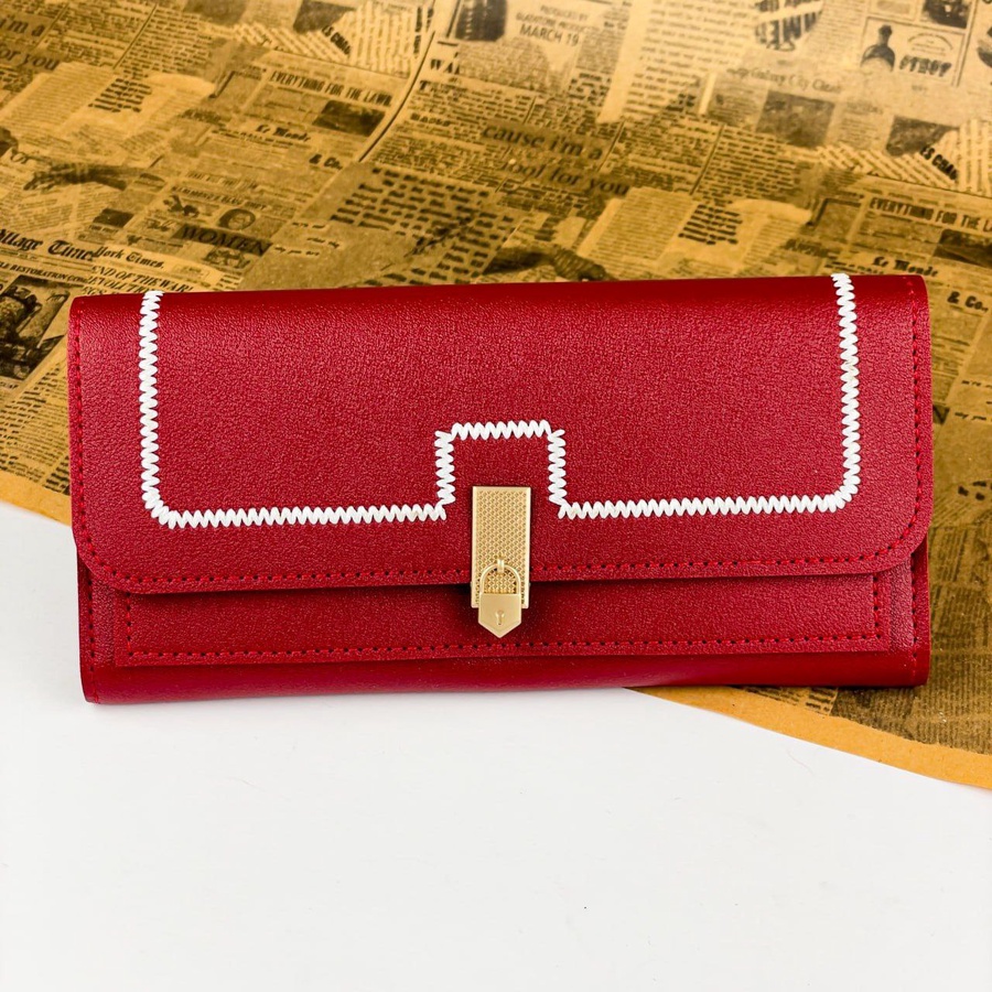 THE CONTRAST STITCH CLUTCH