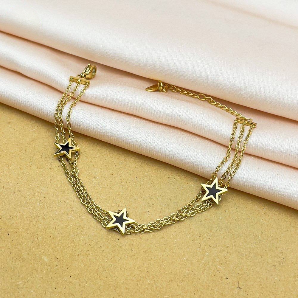 Triple Star Black Gold Bracelet