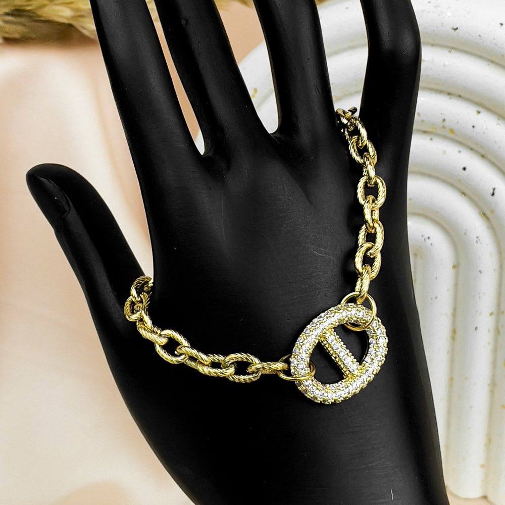 Gold Link Bracelet with Oval Zircon Charm