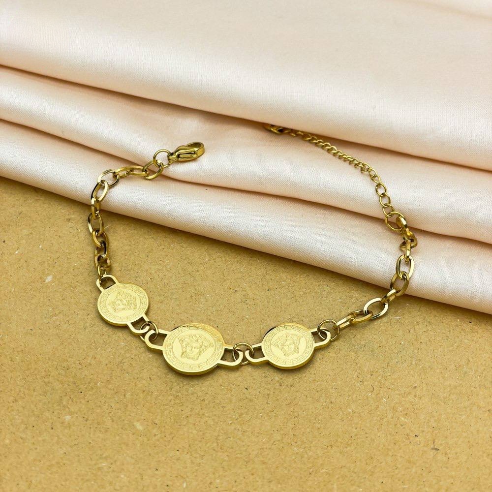Gold Link Bracelet with Triple Vintage Coin Design