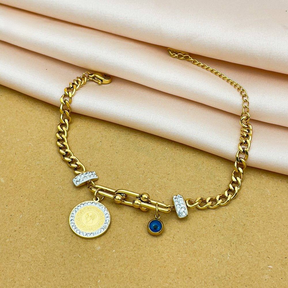 Coin & Blue Eye Crystal Charm Bracelet
