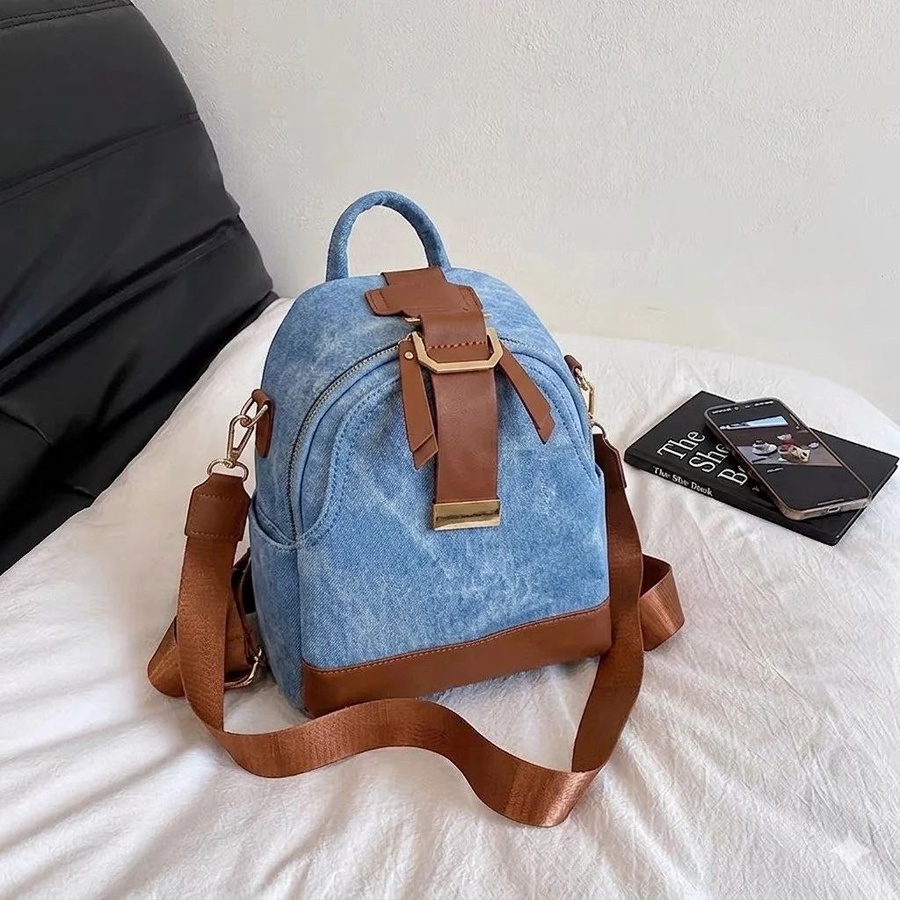 شنطة ظهر نسائية صغيرة (Mini Backpack) قماش كاجوال بتفاصيل جلد | Demand & Beyond