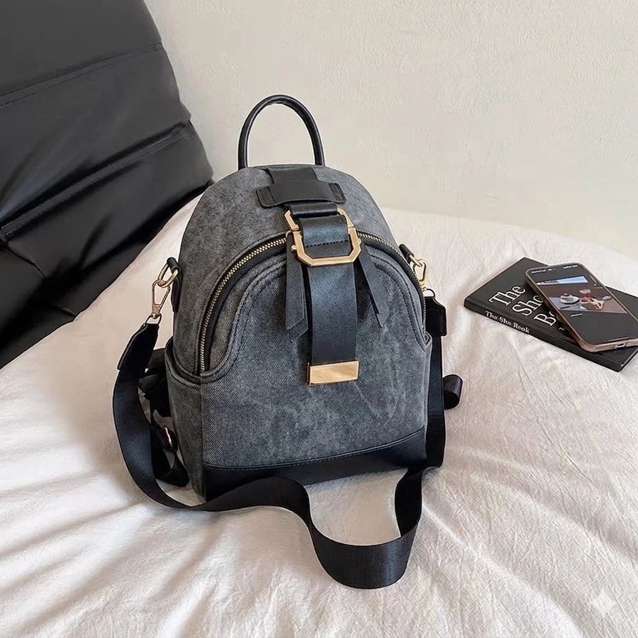 شنطة ظهر نسائية صغيرة (Mini Backpack) قماش كاجوال بتفاصيل جلد | Demand & Beyond