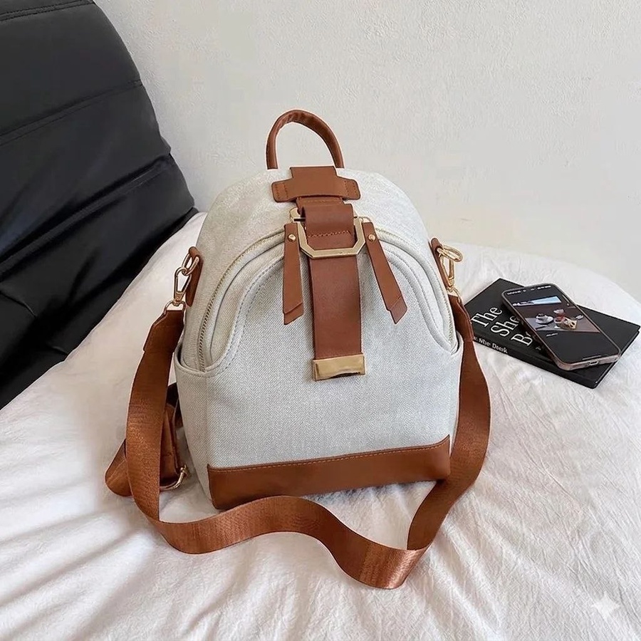 شنطة ظهر نسائية صغيرة (Mini Backpack) قماش كاجوال بتفاصيل جلد | Demand & Beyond