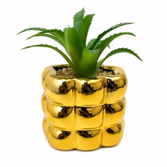 أصيص سيراميك ذهبي لامع مع نبتة صناعية