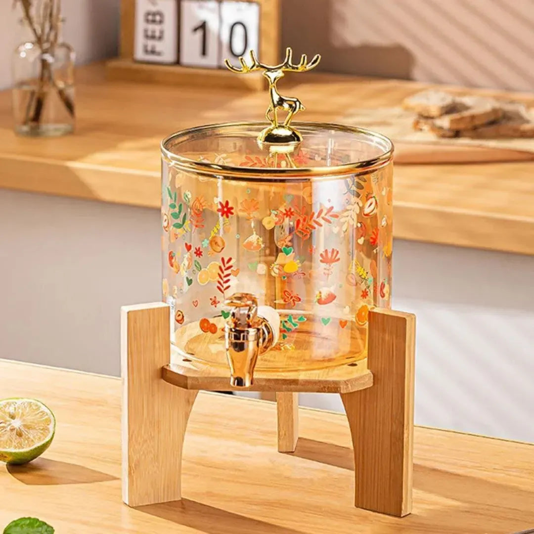  ديسبنسر عصائر زجاجي فاخر بقاعدة خشبية وغطاء الغزال الذهبي . Deer Juice Dispenser