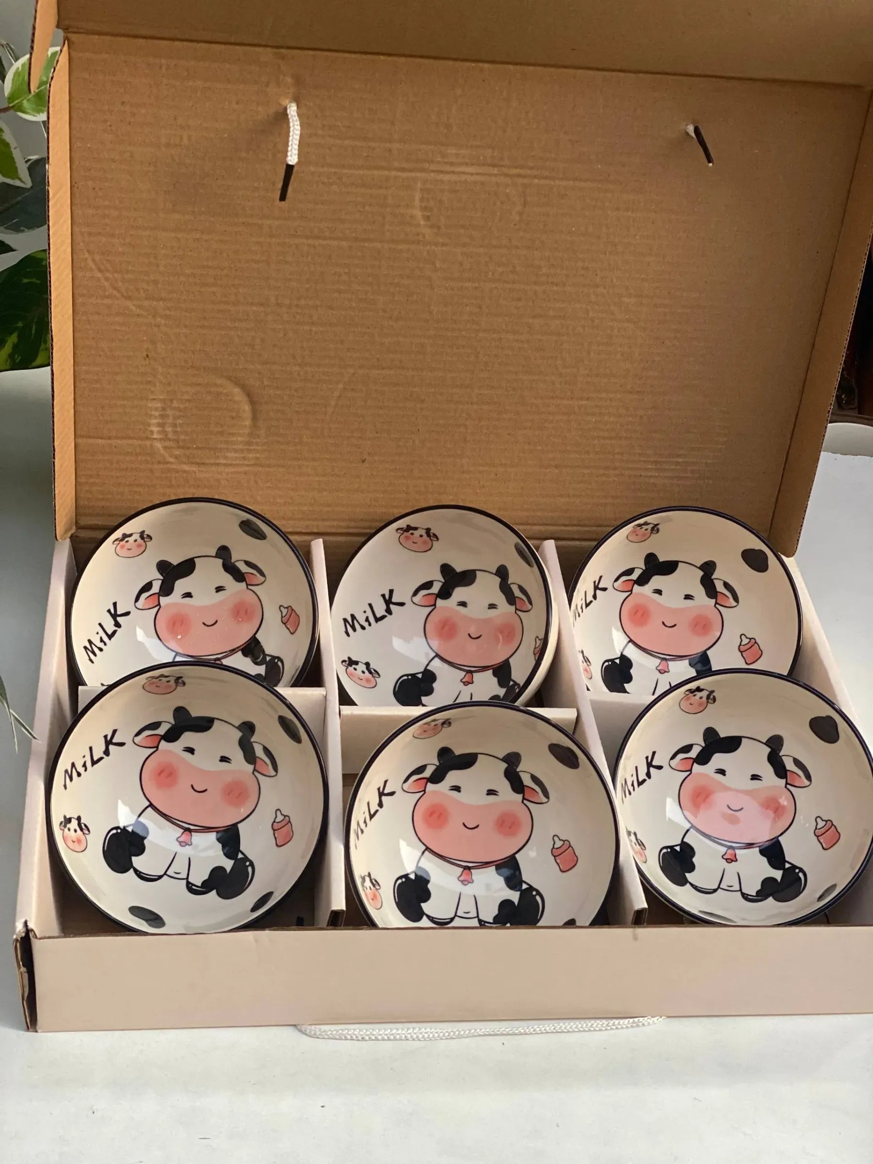 طقم بولات بورسيلين cow printed - ٦ قطع