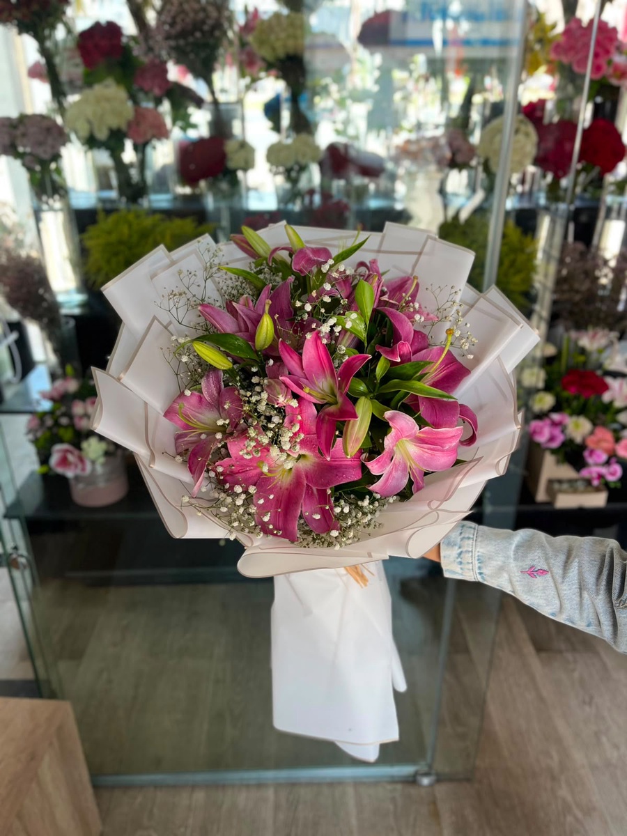 Pink Lilies And Baby Flowers