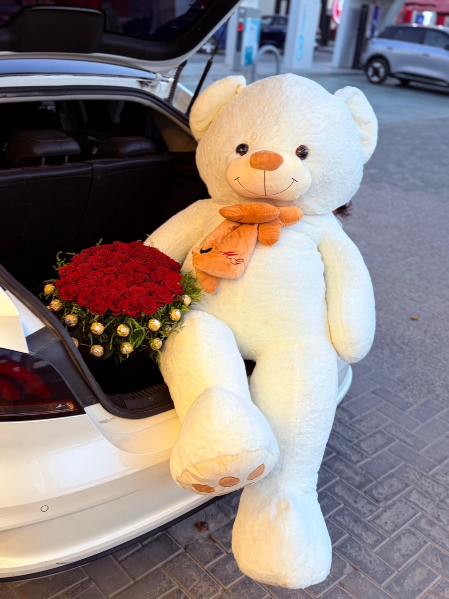 60 red roses, white teddy bear length 180cm and Ferrero Rocher chocolates 