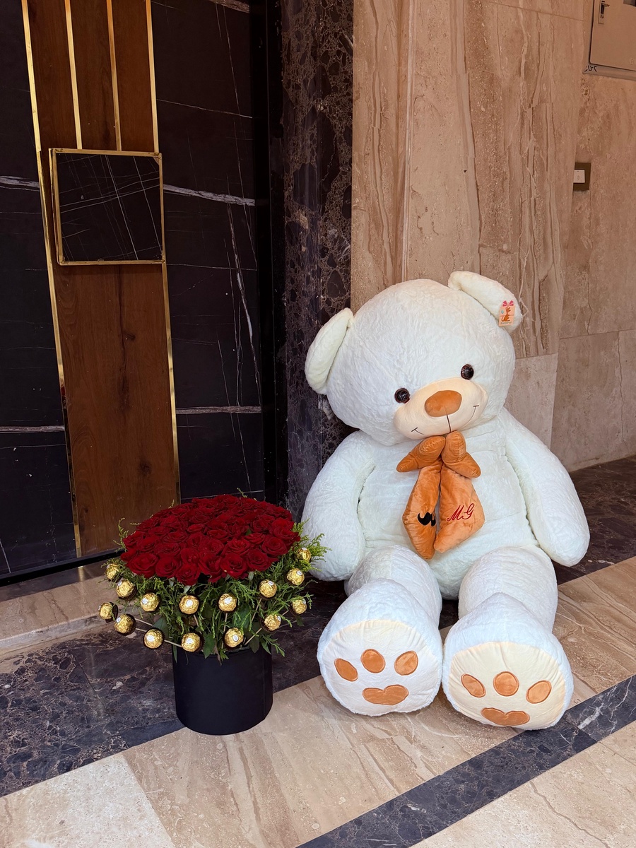 60 red roses, white teddy bear length 180cm and Ferrero Rocher chocolates 