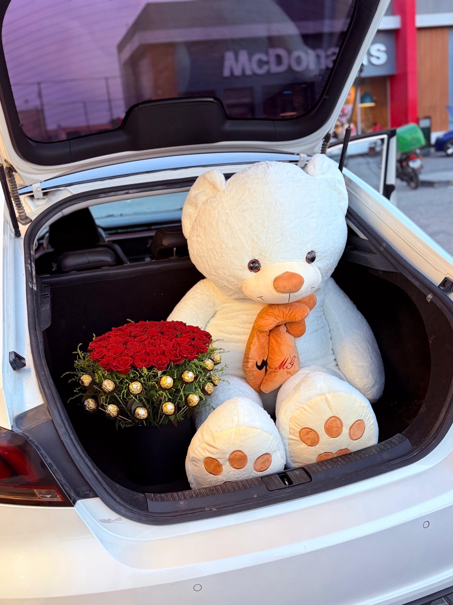 60 red roses, white teddy bear length 180cm and Ferrero Rocher chocolates 