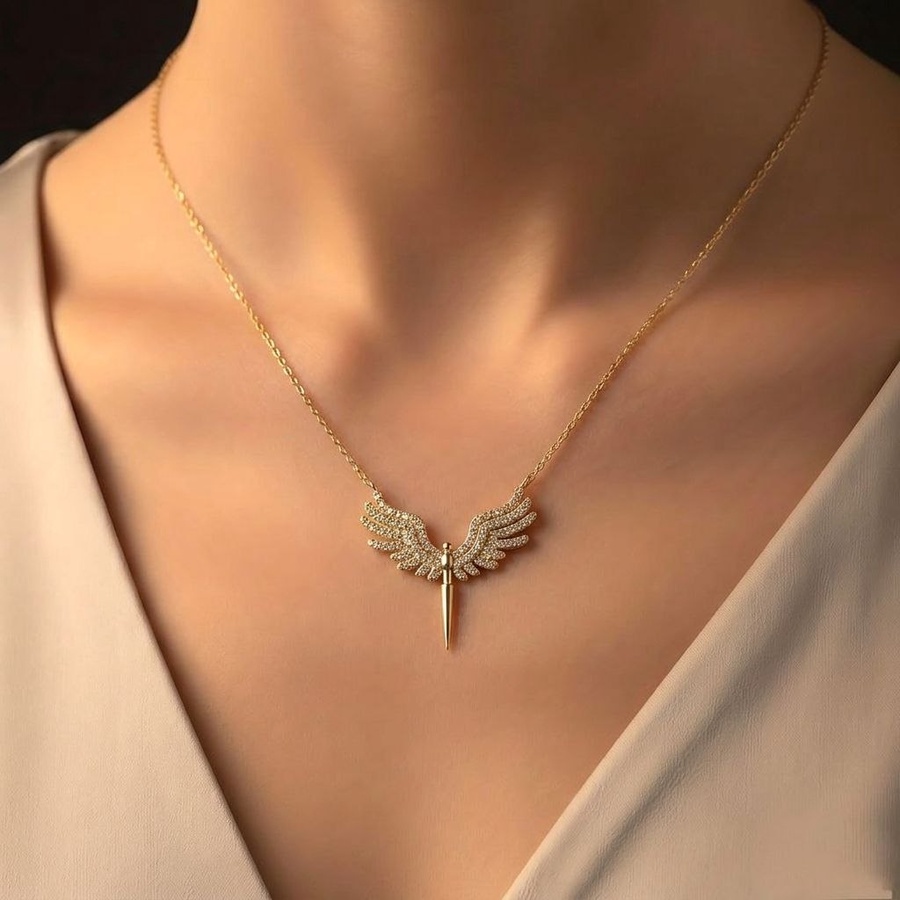 Gold winged pendant necklace