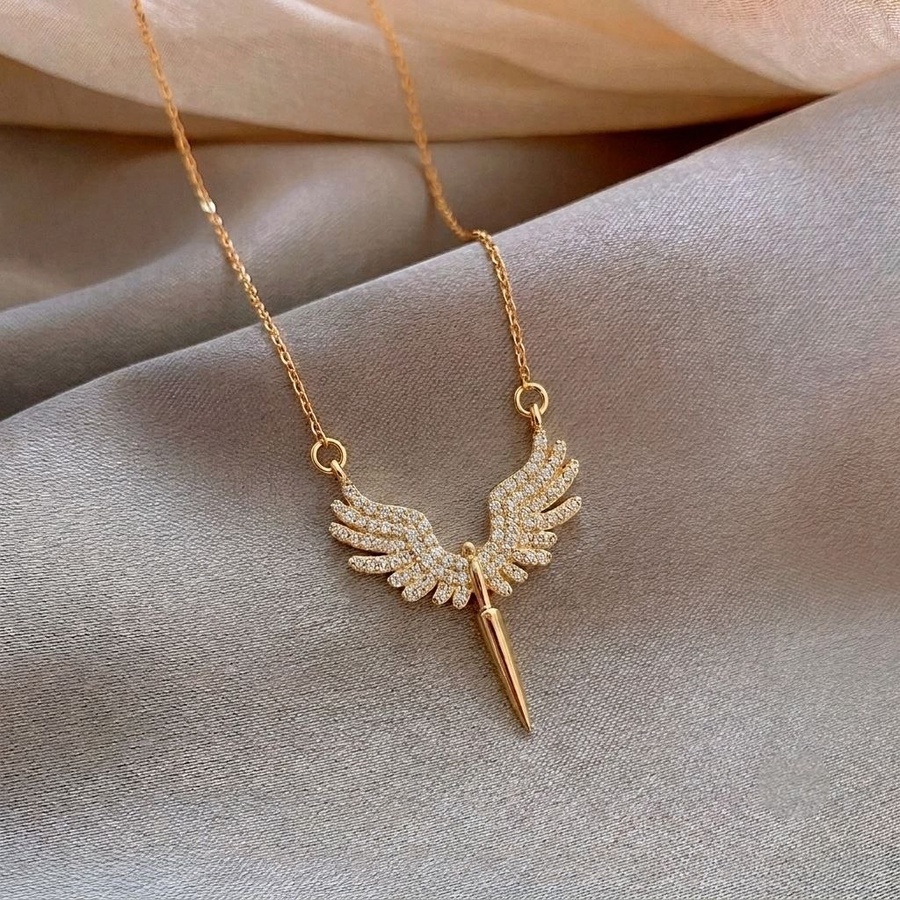 Gold winged pendant necklace