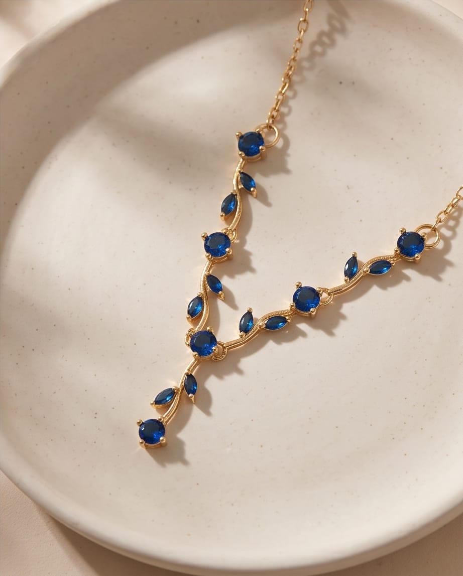 RAWNQ Gold Plated Stainless Steel Leaf Vine Necklace with Blue Cubic Zirconia