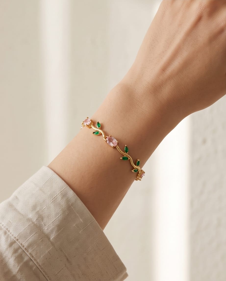 RAWNQ Gold Plated Stainless Steel Leaf Vine Bracelet with Pink and Green Cubic Zirconia