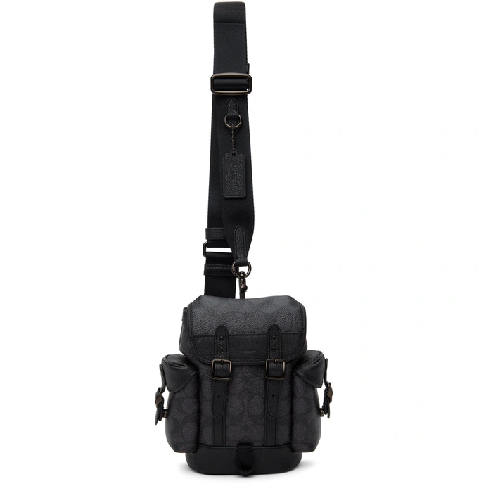 Redefine your daily commute with the Coach Signature Unisex Sling Bag #0057