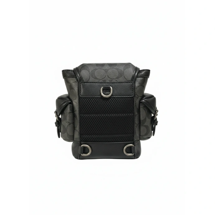 Redefine your daily commute with the Coach Signature Unisex Sling Bag #0057