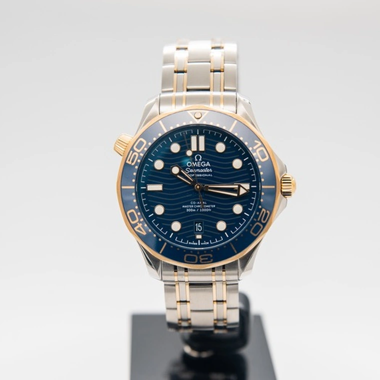 Omega Watch For Men - Seamaster Diver 300M Co-Axial Master Chronometer 42 mm, Steel-Yellow Gold, Blue Dial - Ref. 210.20.42.20.03.001