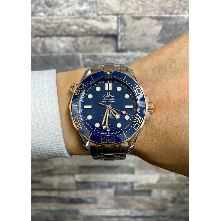Omega Watch For Men - Seamaster Diver 300M Co-Axial Master Chronometer 42 mm, Steel-Yellow Gold, Blue Dial - Ref. 210.20.42.20.03.001