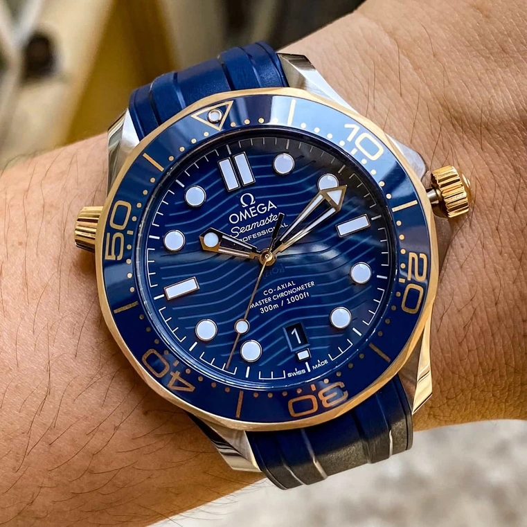 Omega Watch For Men - Seamaster Diver 300M, Steel-Yellow Gold on Blue Rubber Strap - Ref. 210.22.42.20.03.001