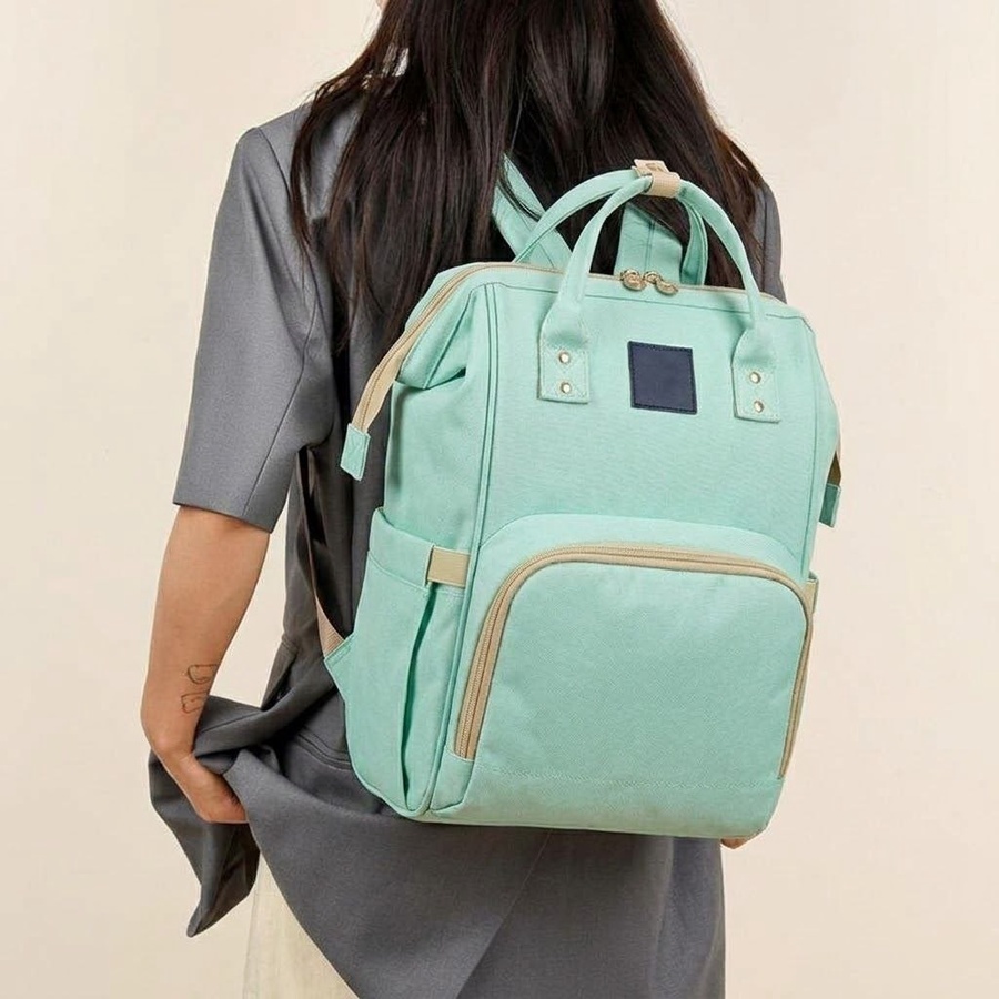شنطة مستلزمات بيبي Momolly (Diaper Bag) بجيوب حرارية ومكان للمناديل – عملية وأنيقة للأمهات ماركة موملي