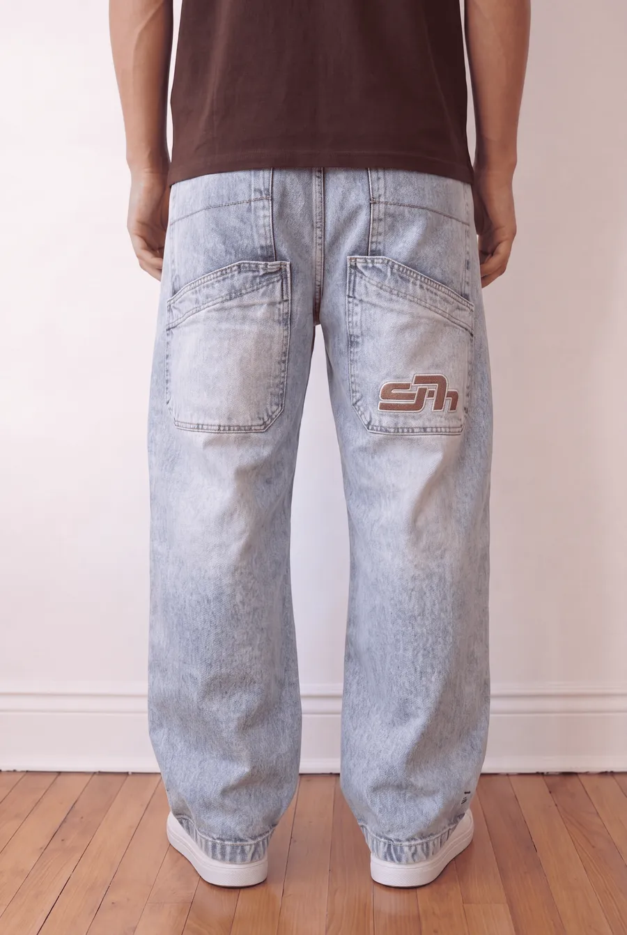 Light blue embroidered seven baggy jeans