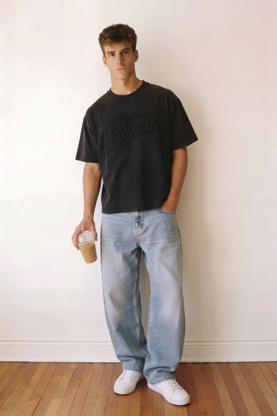 Washed black embossed seven Tshirt